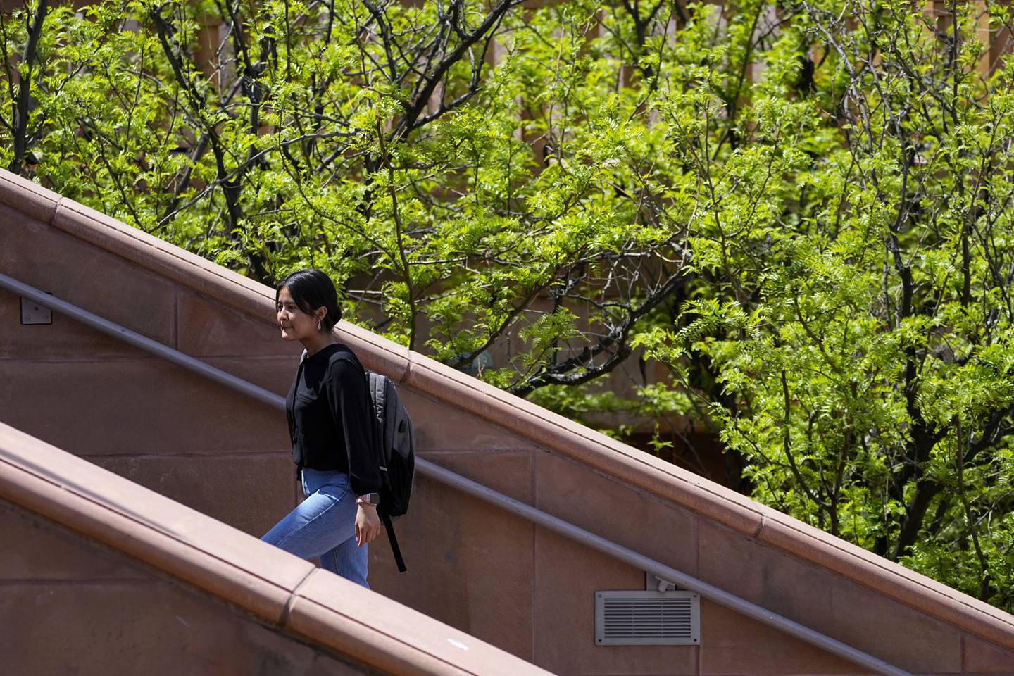 Fahima Sultani walks on campus at Arizona State University, Friday, April 7, 2023, in Tempe, Ariz.