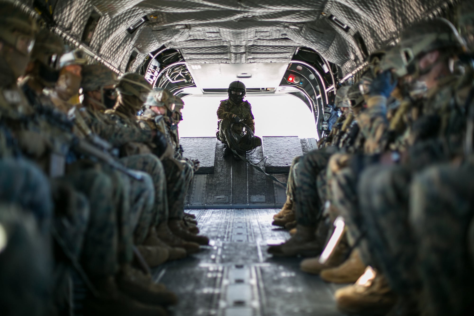 A crew chief with the 30th Infantry Regiment, 12th Brigade, Japan Ground Self-Defense Force and U.S. Marines conduct an air assault during exercise Forest Light Eastern Army in mainland Japan, on Dec. 15, 2020.