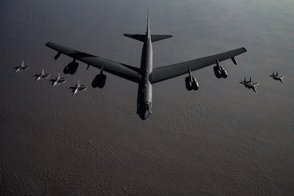 A B-52 Stratofortress flies in formation with F-16 Fighting Falcons and F-15E Strike Eagles during a Bomber Task Force mission over the U.S. Central Command area of responsibility, Nov. 21, 2020.