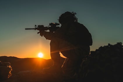 Hospitalman Keifer Ralph sets into a defensive position in support of the Battalion Distributed Operations Course during Service Level Training Exercise 1-21 at Marine Corps Air Ground Combat Center Twentynine Palms, Calif., Oct. 28, 2020.