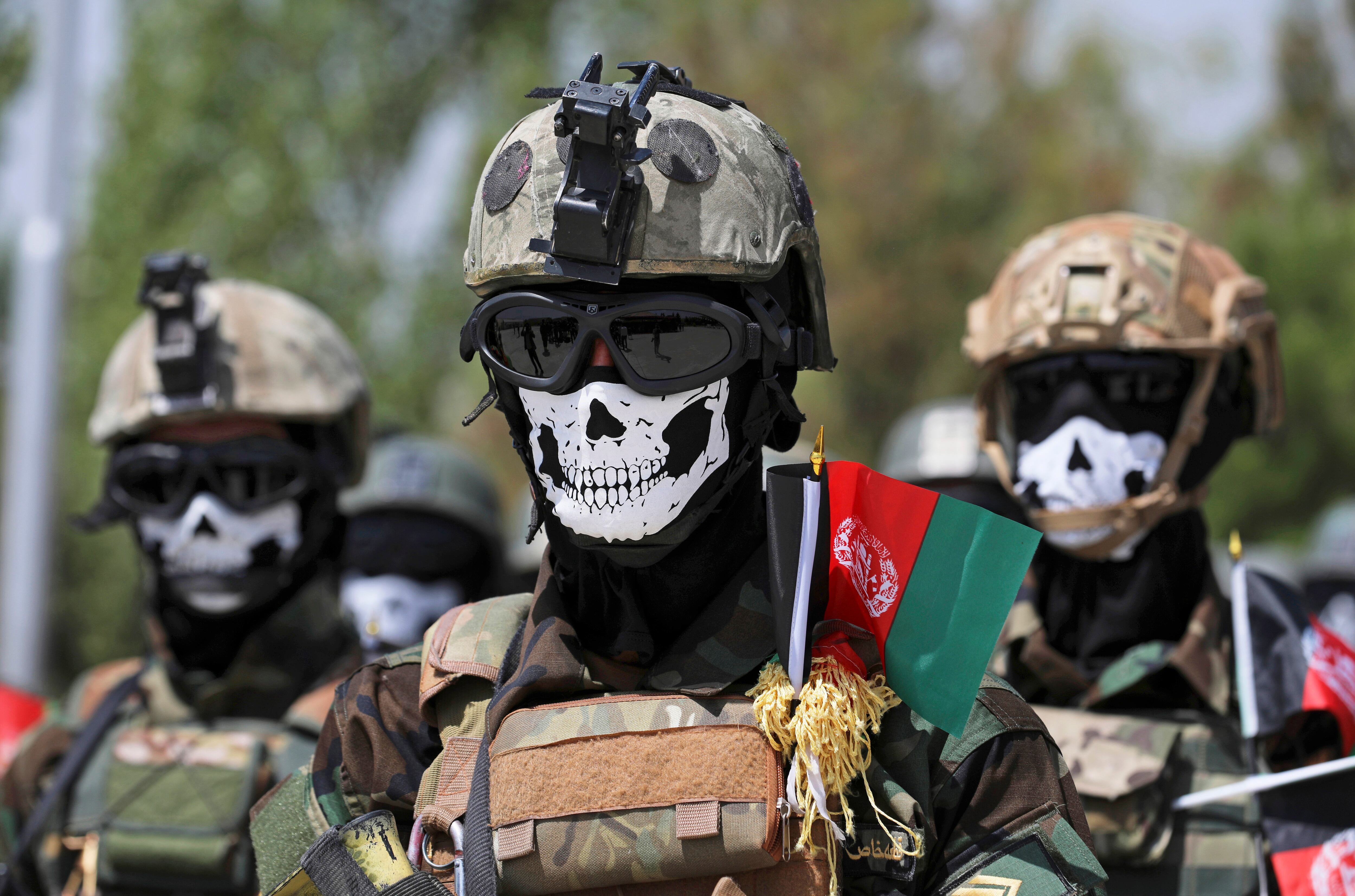 New Afghan Army special forces members attend their graduation ceremony after a three-month training program at the Kabul Military Training Center in Kabul, Afghanistan, Saturday, July 17, 2021.