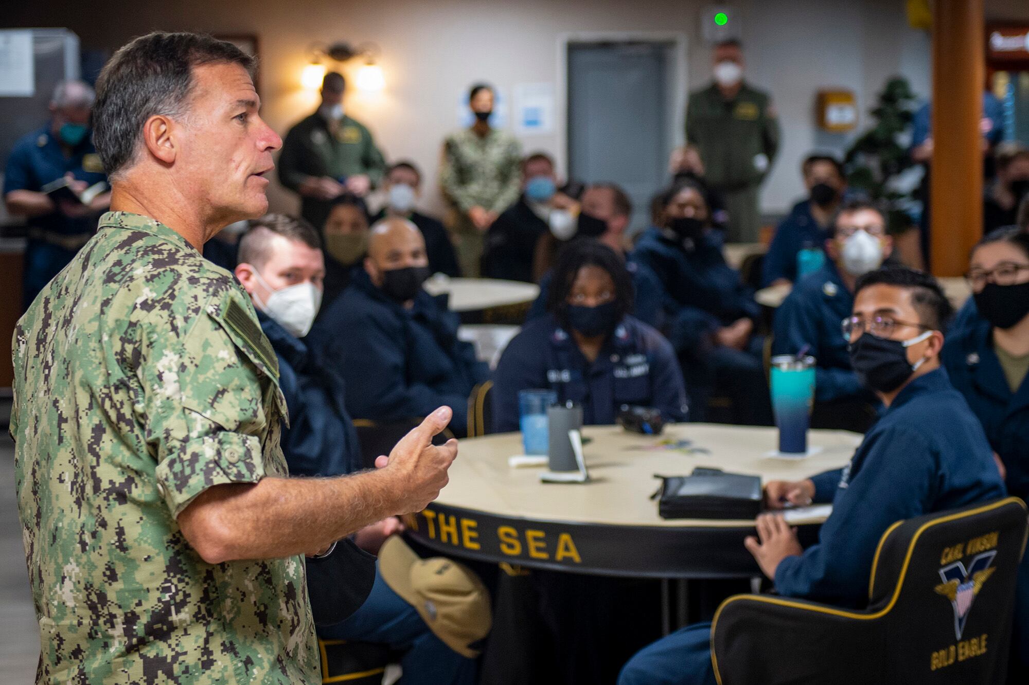 Adm. John Aquilino, commander of U.S. Pacific Fleet, speaks with sailors assigned to the USS Carl Vinson (CVN 70) on Feb. 8, 2021.