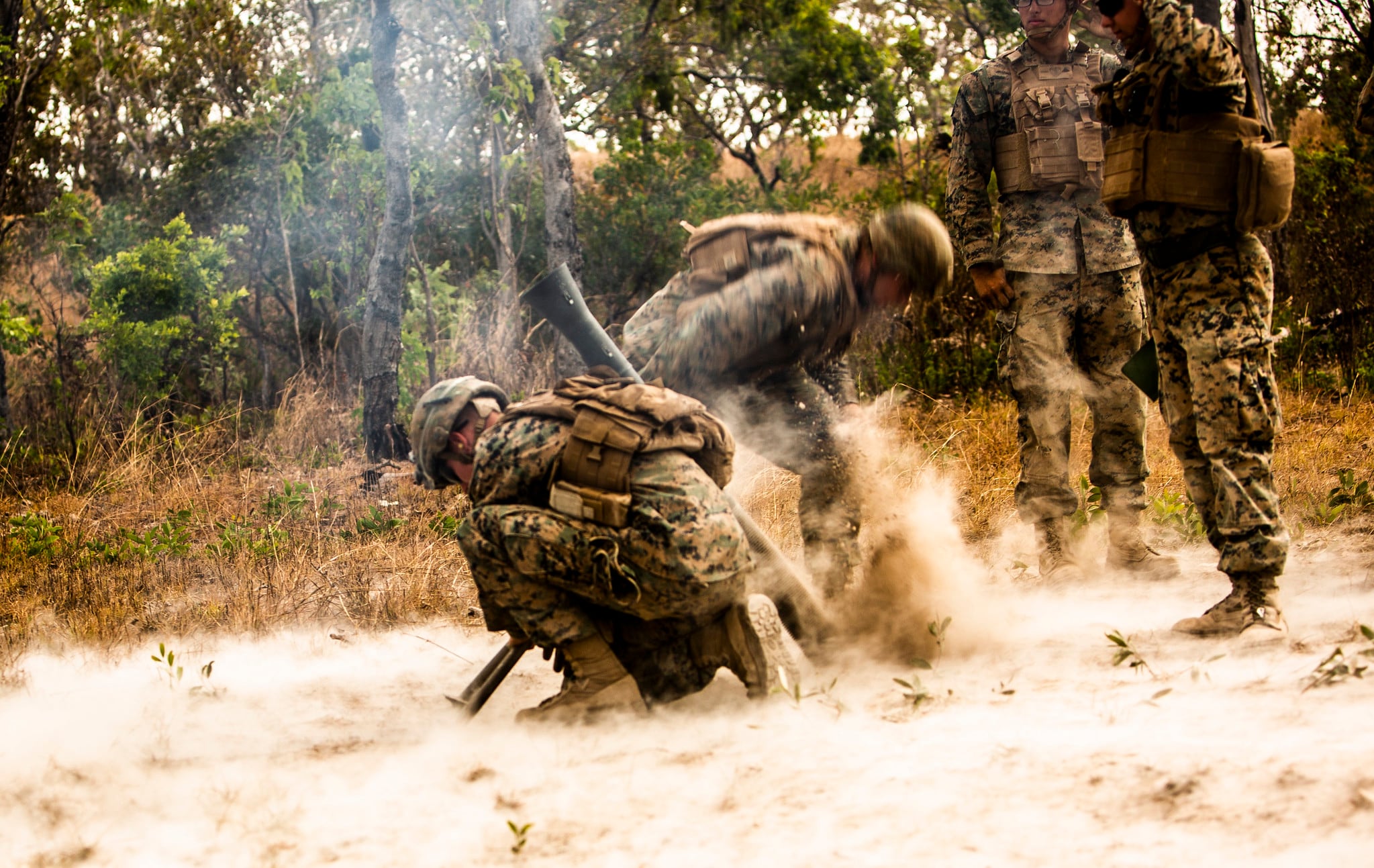 Marines with 3rd Battalion, 3rd Marine Regiment,  a part of Marine Rotational Force - Darwin, fire an M252 81mm extended range mortar system during a fire support coordination exercise at Mount Bundey Training Area, Australia, Aug. 9, 2019.