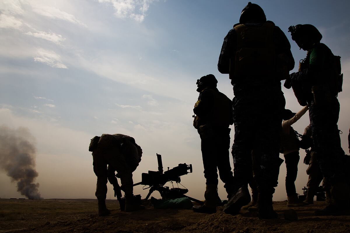 Iraqi federal policemen fire a M2A1 .50 caliber machine gun during a live-fire exercise at the Besmaya Range Complex, Iraq, June 10, 2019.