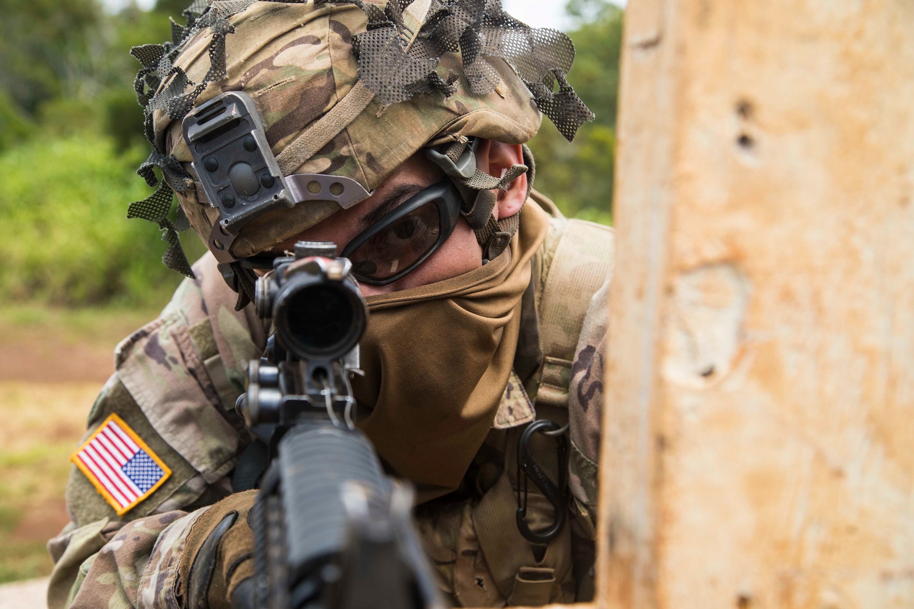 A soldier scans his lane during a rifle qualification range May 1, 2020 at Schofield Barracks, Hawaii.