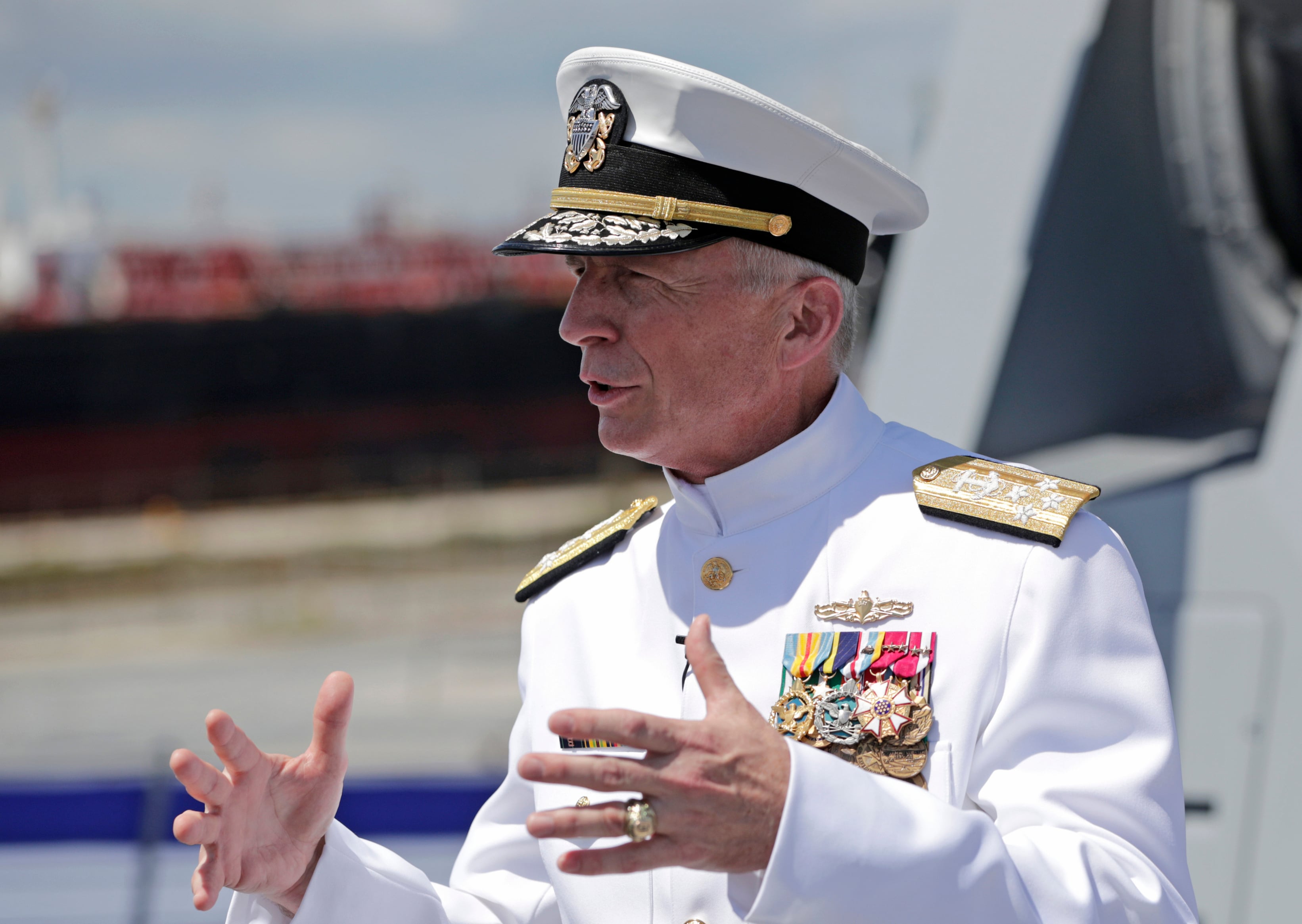 In this  July 27, 2019, file photo, Adm. Craig Faller, commander of U.S. Southern Command, speaks with the news media following a commissioning ceremony for the U.S. Navy's guided missile destroyer Paul Ignatius, at Port Everglades in Fort Lauderdale, Fla.