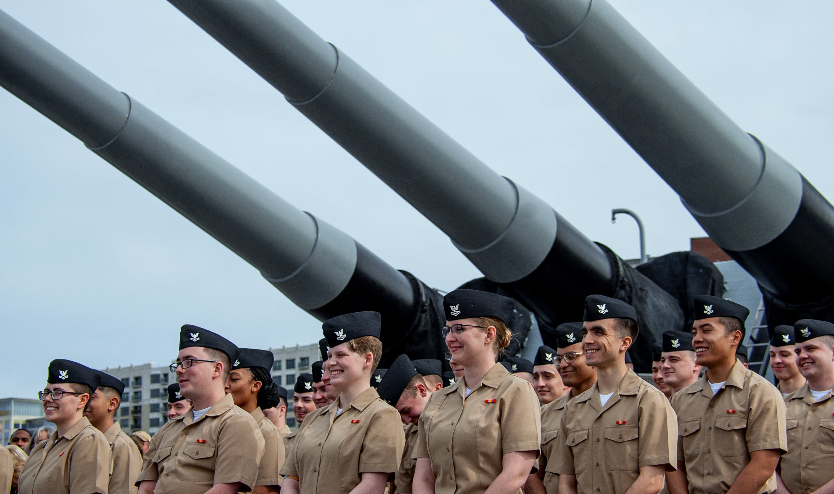 Pre-Commissioning Unit John F. Kennedy CVN-79 Reactor Department sailors stand in formation onboard the Battleship USS Wisconsin (BB-64) prior to their group reenlistment on Jan. 30, 2020, in Norfolk, Va.