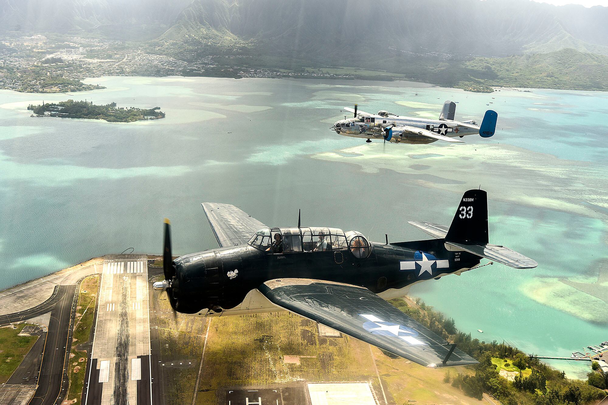 Vintage aircraft fly in formation over Oahu, Hawaii, on Sept. 1, 2020, for the 75th commemoration of the end of WWII.