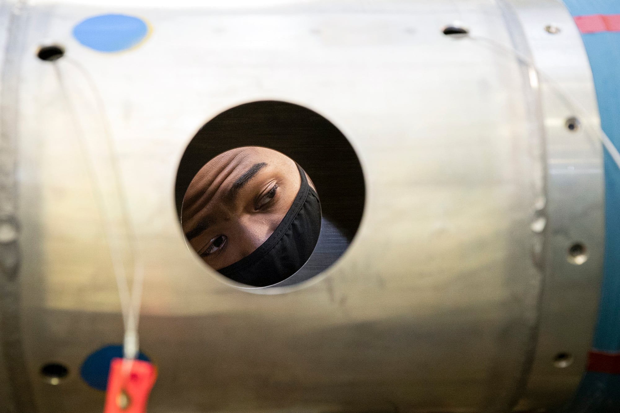 Aviation Ordnanceman Airman Devin Fredrick, assigned to the aircraft carrier USS Gerald R. Ford (CVN 78), installs an arming device on a MK-63 1,000-pound inert mine, Sept. 3, 2020.