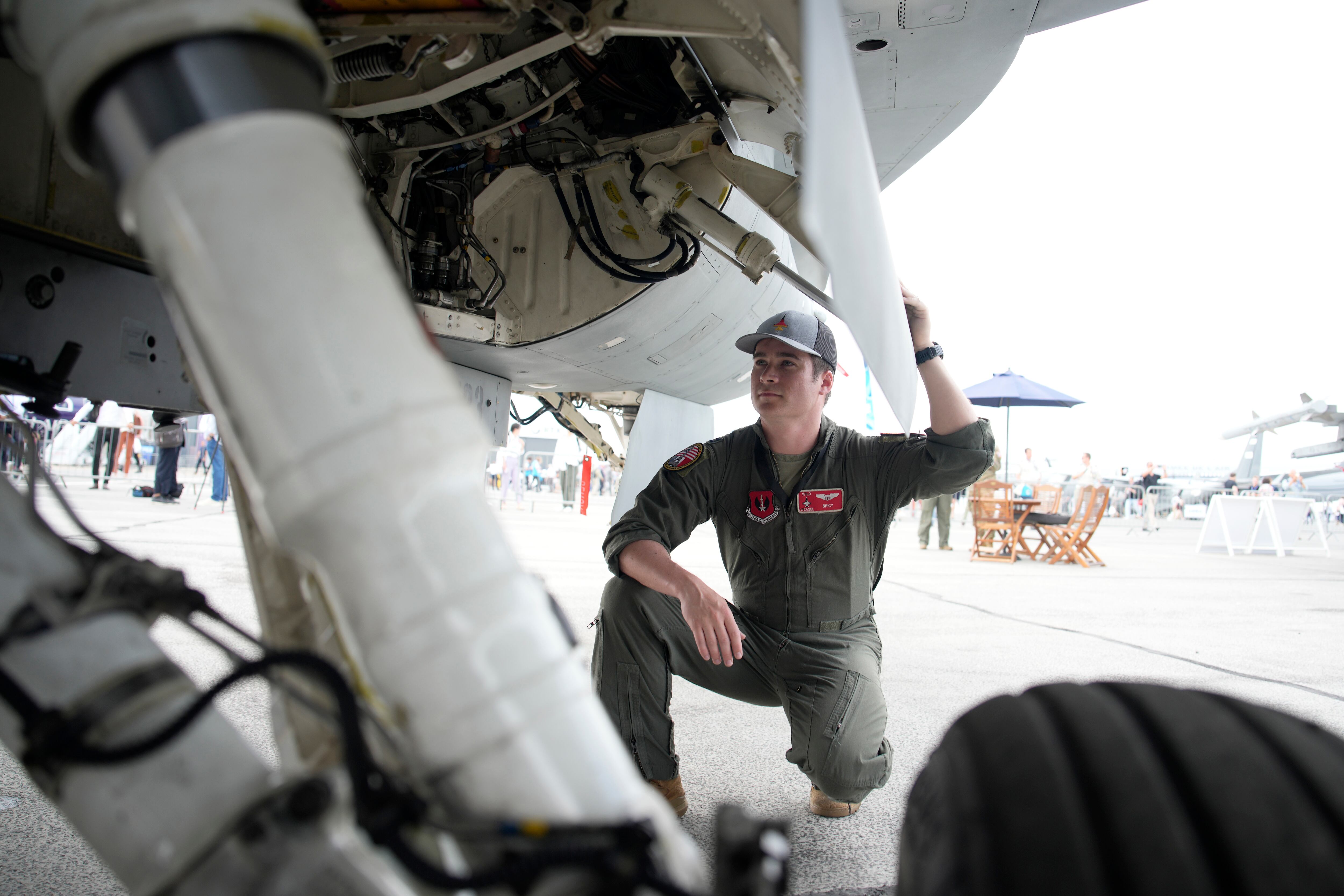 Capt. David Brown, aka Spicy, a U.S. Air Force F-16 fighter jet pilot poses for a photo after an interview at the Paris Air Show in Le Bourget, north of Paris, France, Tuesday, June 20, 2023.