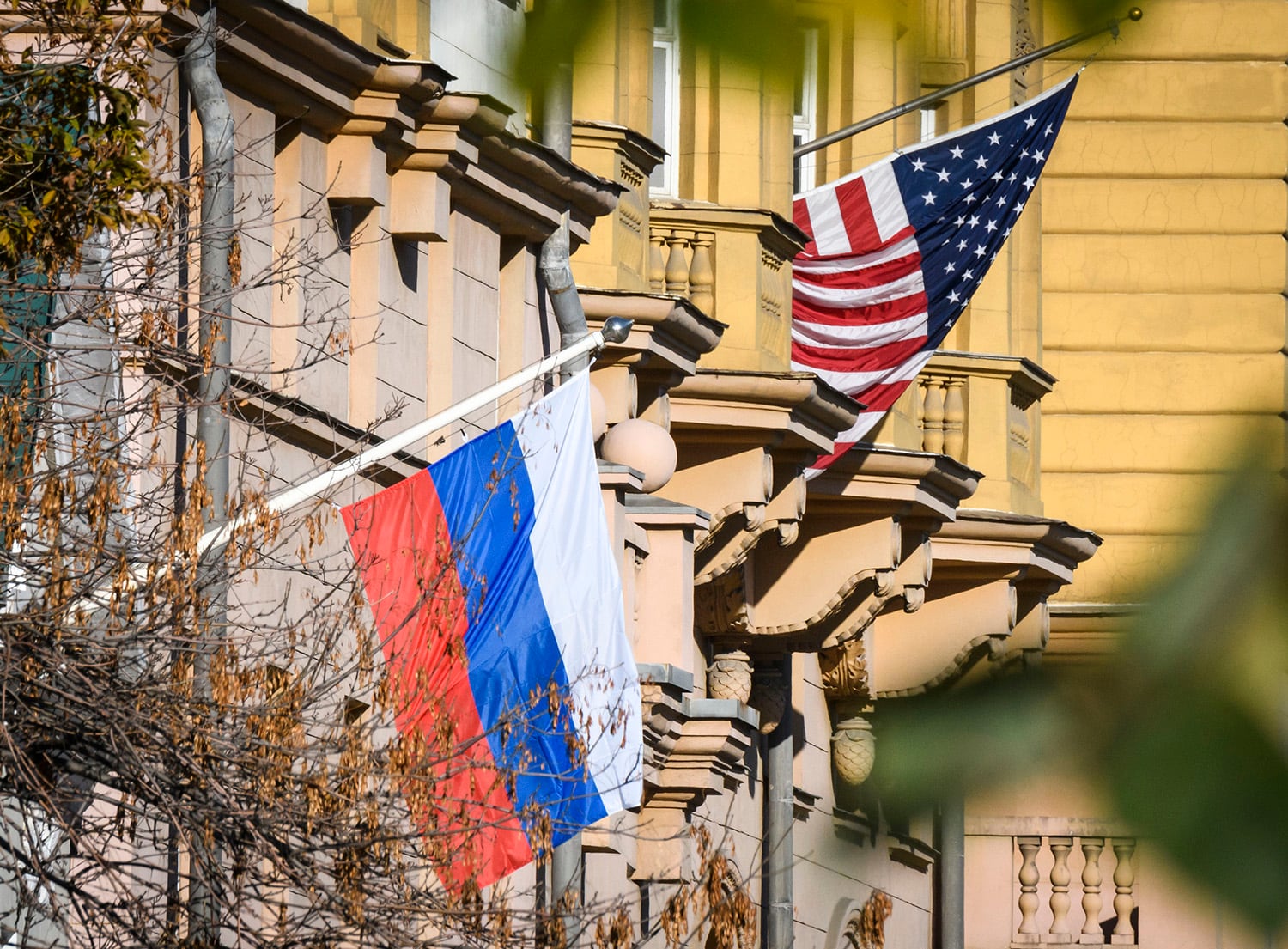 A Russian flag flies next to the US Embassy building in Moscow on Oct. 22, 2018.