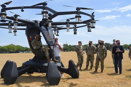 Chief of Staff of the Air Force Gen. Charles Q. Brown Jr. sits in a LIFT Aircraft Hexa aircraft during a visit to Camp Mabry, Texas, Aug. 20, 2020.