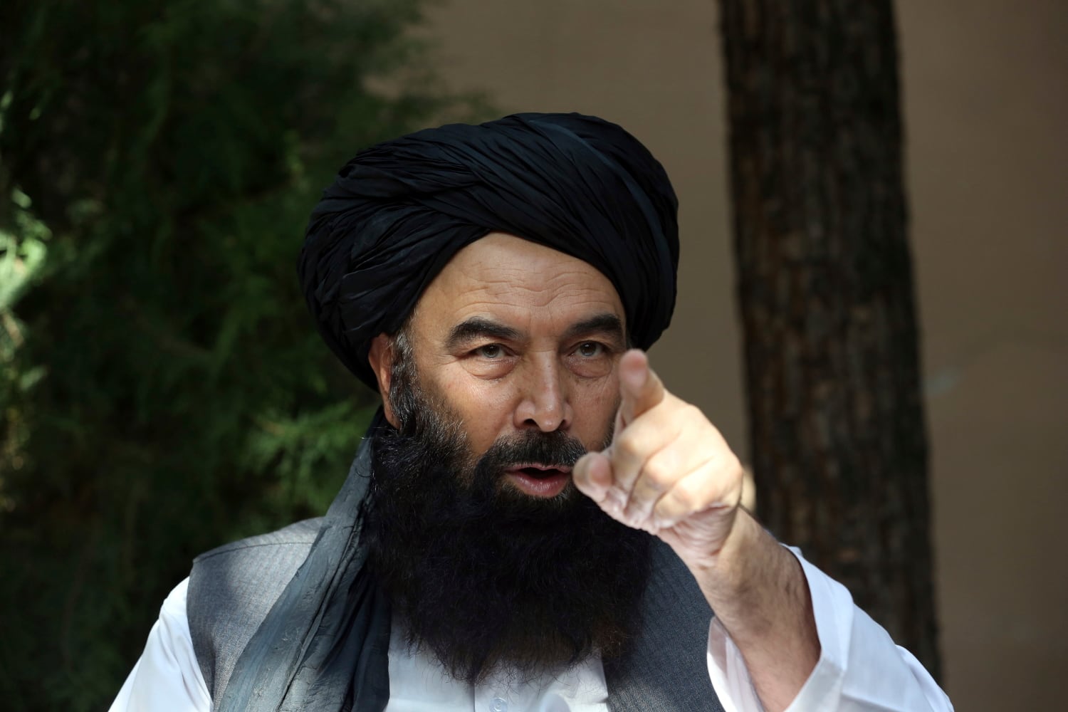 In this Thursday, Aug. 29, 2019, photo, A former Taliban military leader Syed Akbar Agha speaks during an interview with the Associated Press in Kabul, Afghanistan.