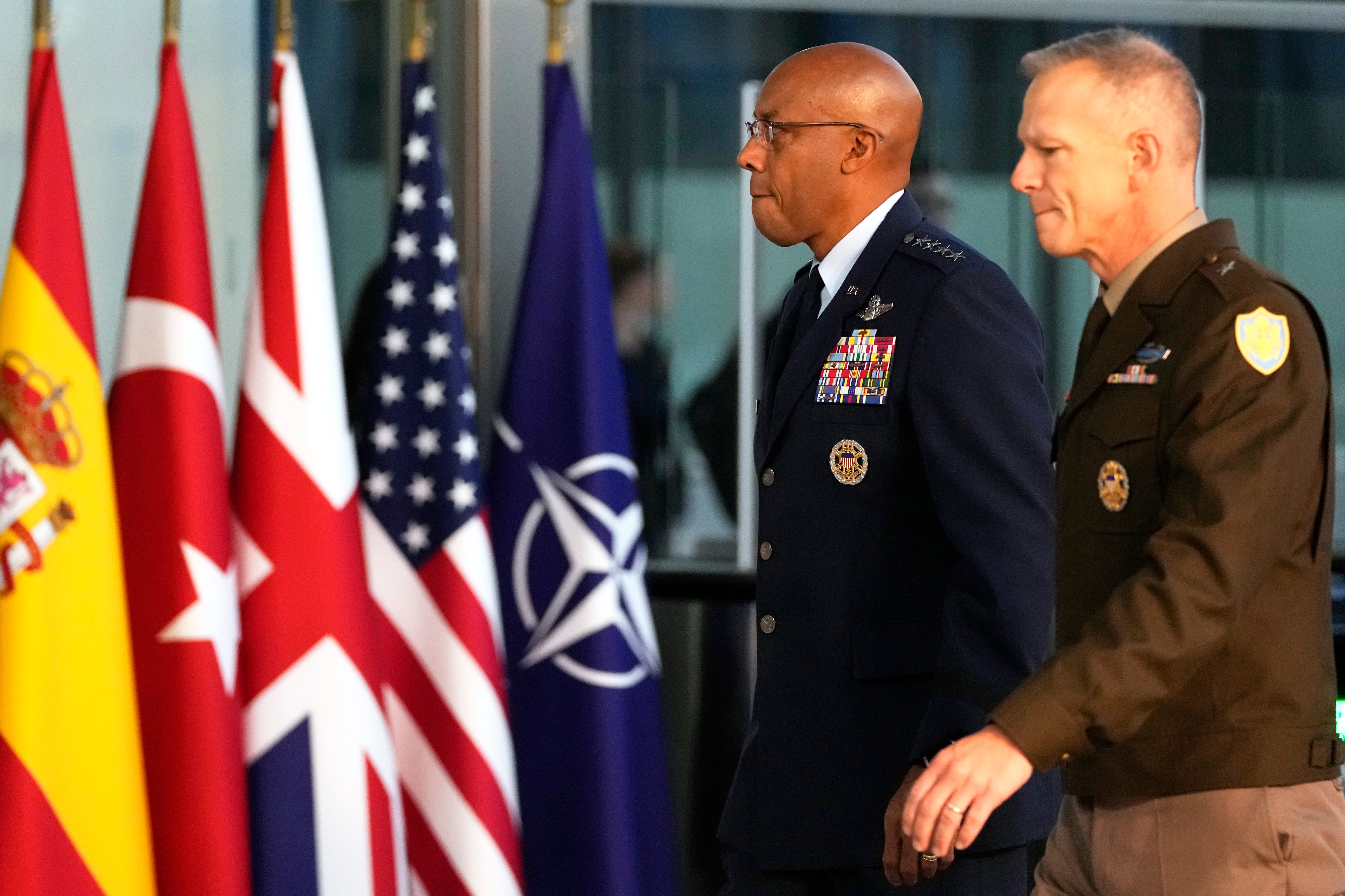 Chairman of the Joint Chiefs of Staff, U.S. Air Force Gen. CQ Brown, center, arrives for a meeting of NATO defense ministers at NATO headquarters in Brussels, Wednesday, Oct. 11, 2023.