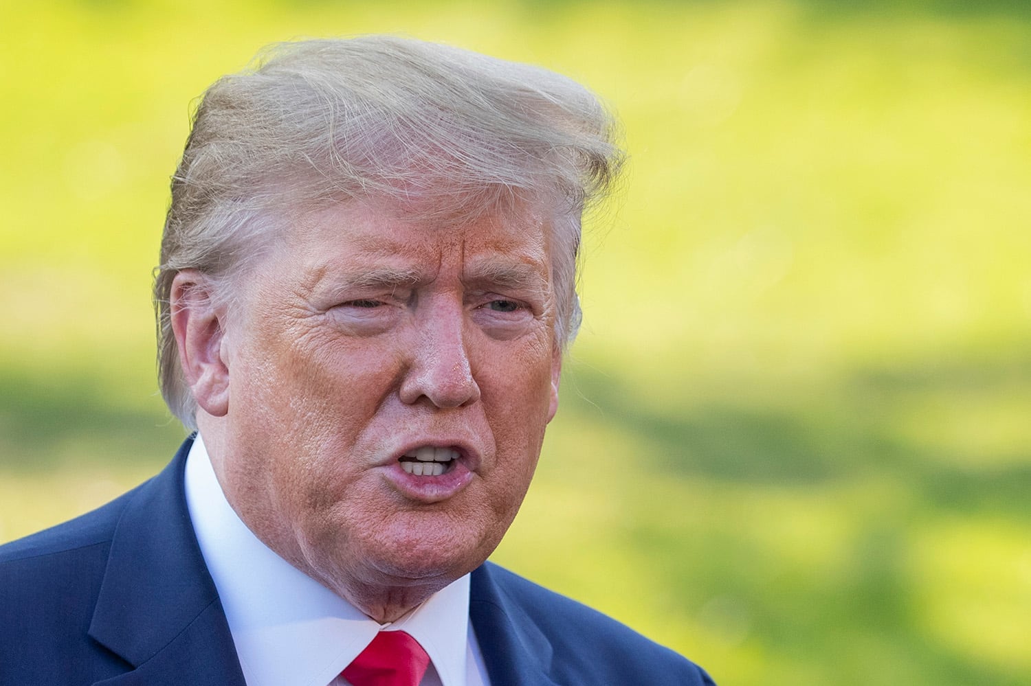 President Donald Trump speaks before leaving the White House