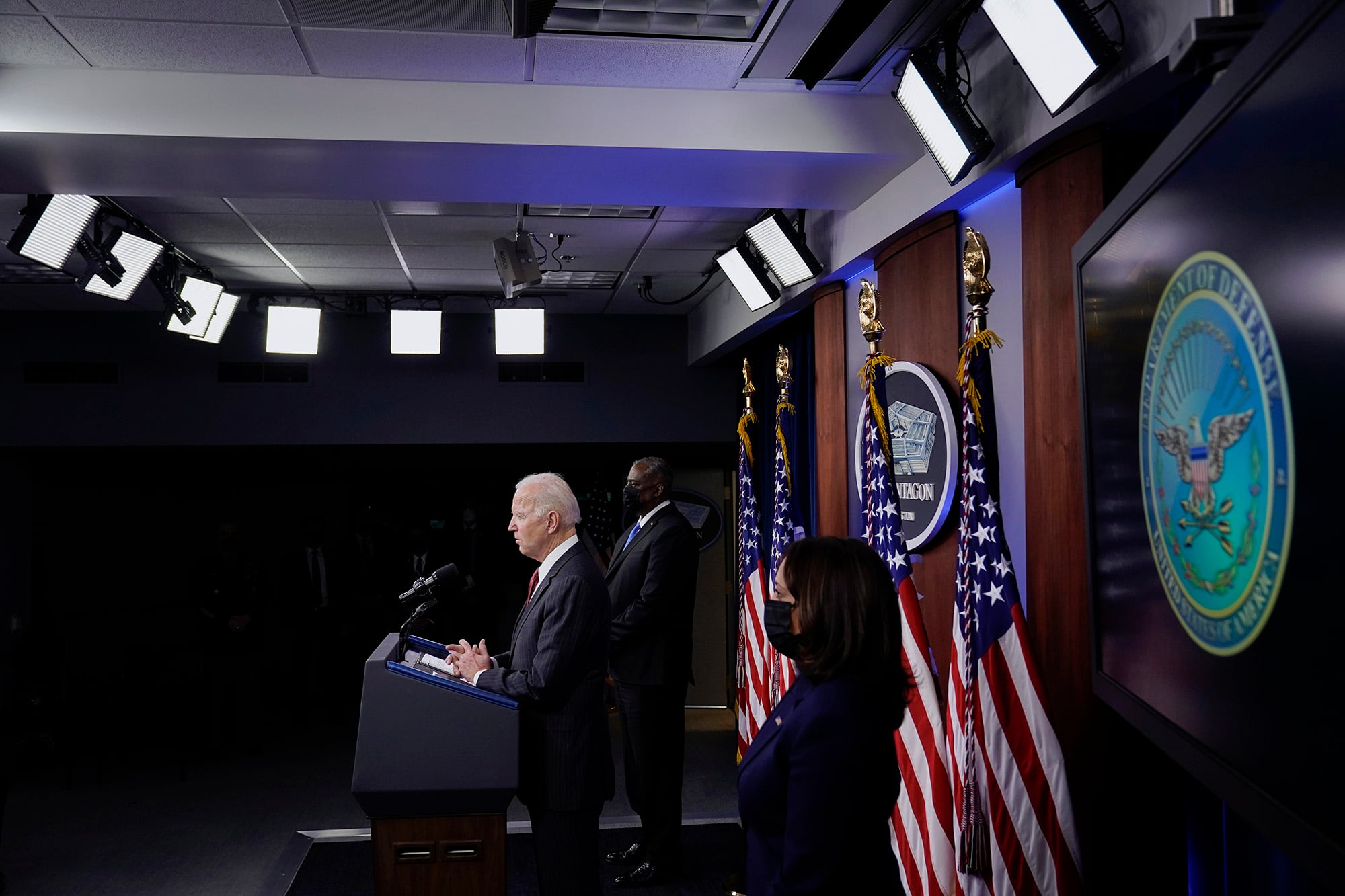 President Joe Biden speaks as Secretary of Defense Lloyd Austin and Vice President Kamala Harris accompany him at the Pentagon, Wednesday, Feb. 10, 2021, in Washington.