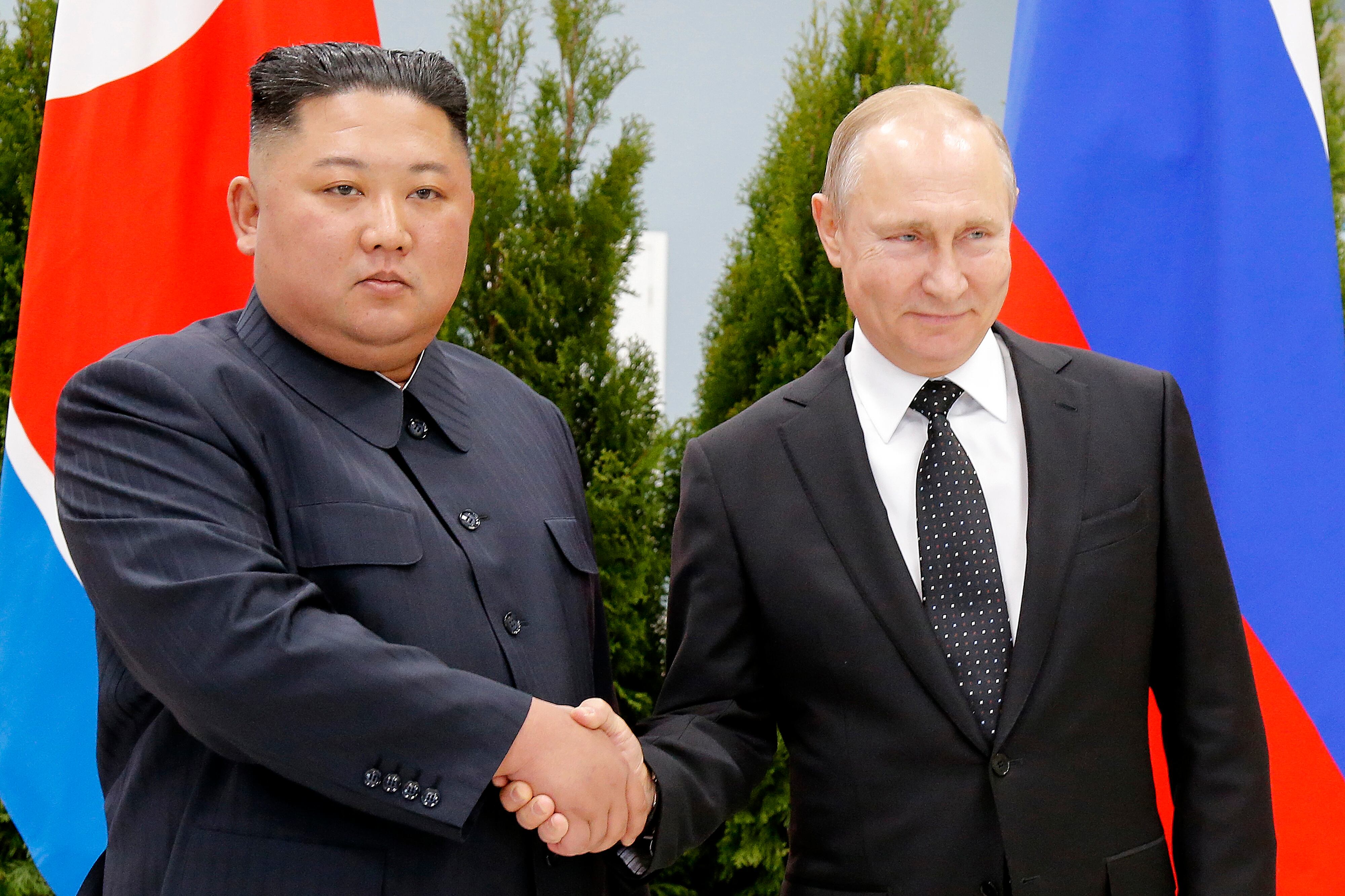 Russian President Vladimir Putin, right, and North Korea's leader Kim Jong Un shake hands during their meeting in Vladivostok, Russia, Thursday, April 25, 2019.