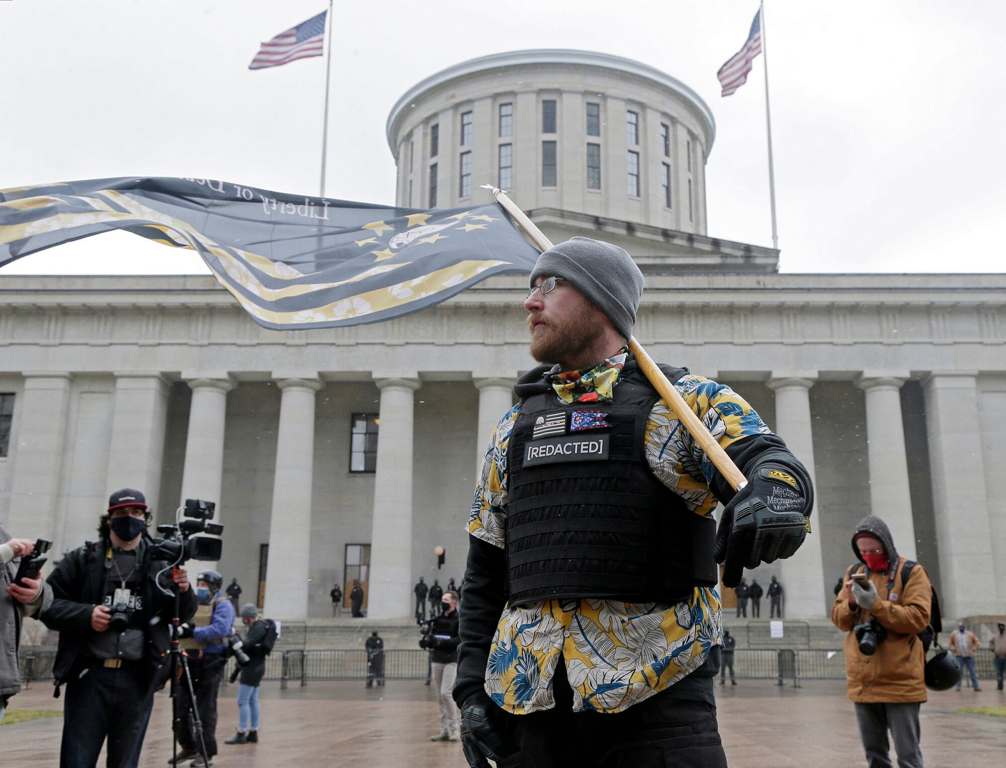 Members of the Boogaloo Boys attend protest Sunday at the Ohio Statehouse in downtown Columbus, Ohio, Sunday, Jan. 17, 2021.