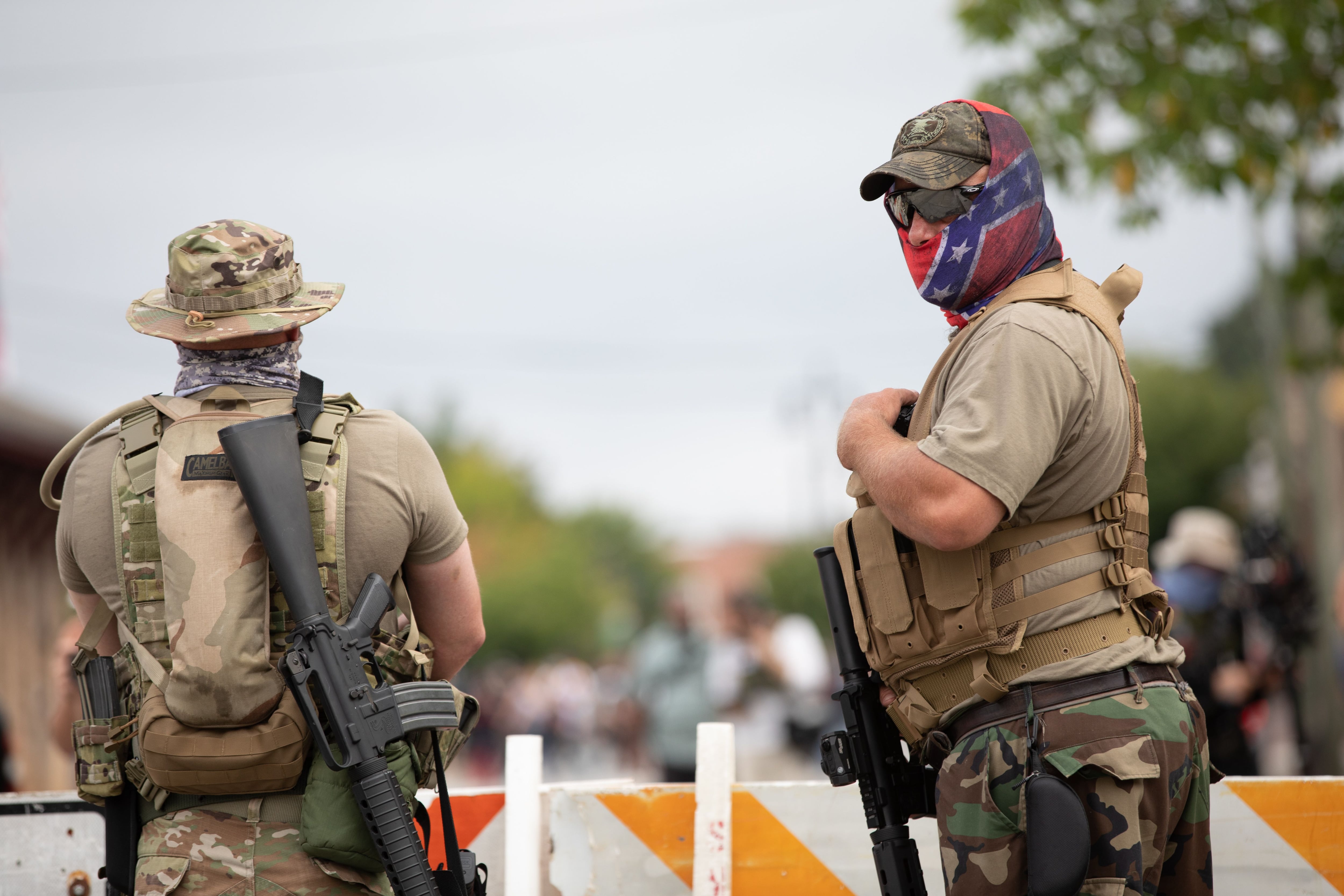 Members of far right militias and white pride organizations rally near Stone Mountain Park in Stone Mountain, Georgia, on August 15, 2020