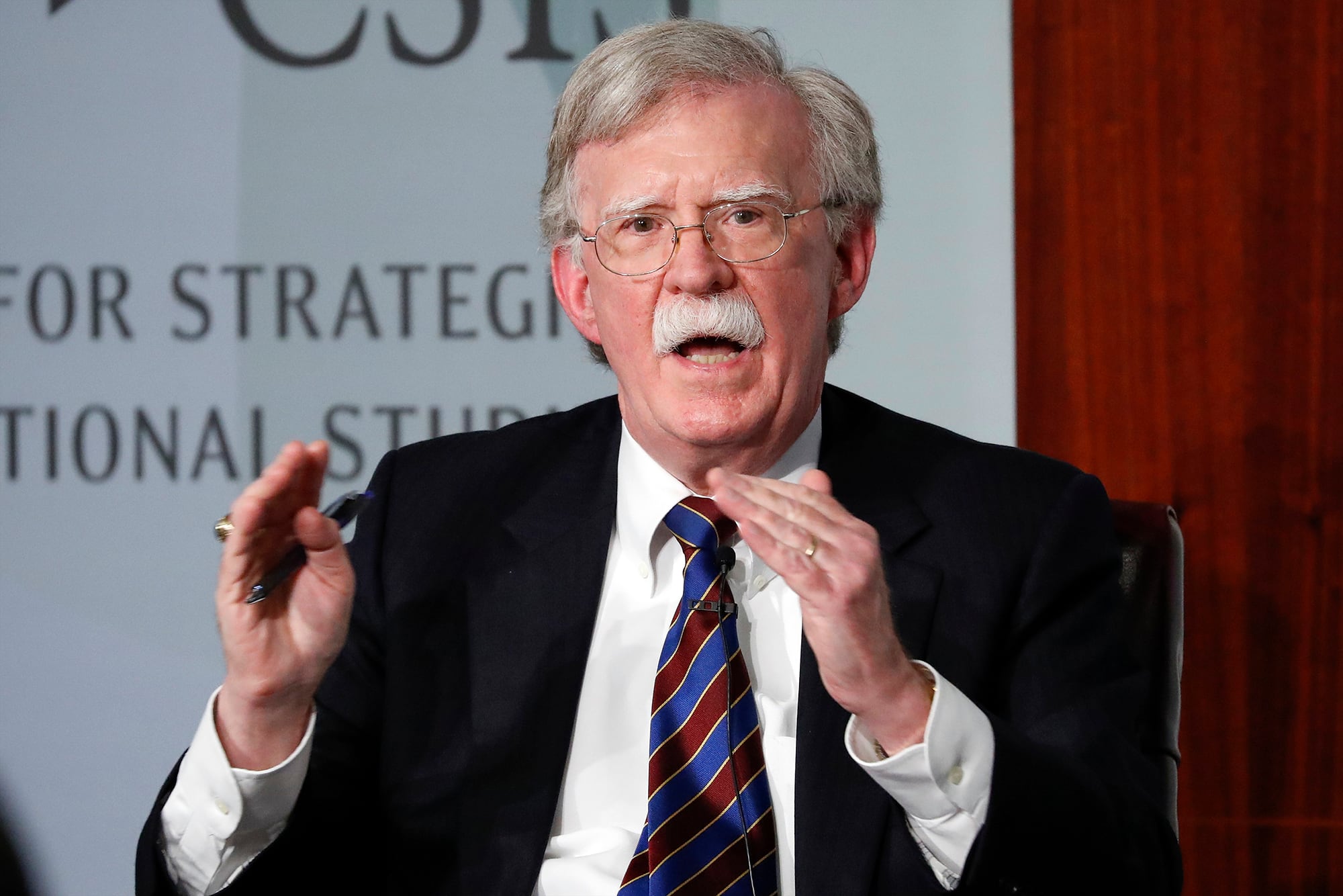 In this Sept. 30, 2019, file photo, former national security adviser John Bolton gestures while speakings at the Center for Strategic and International Studies in Washington.