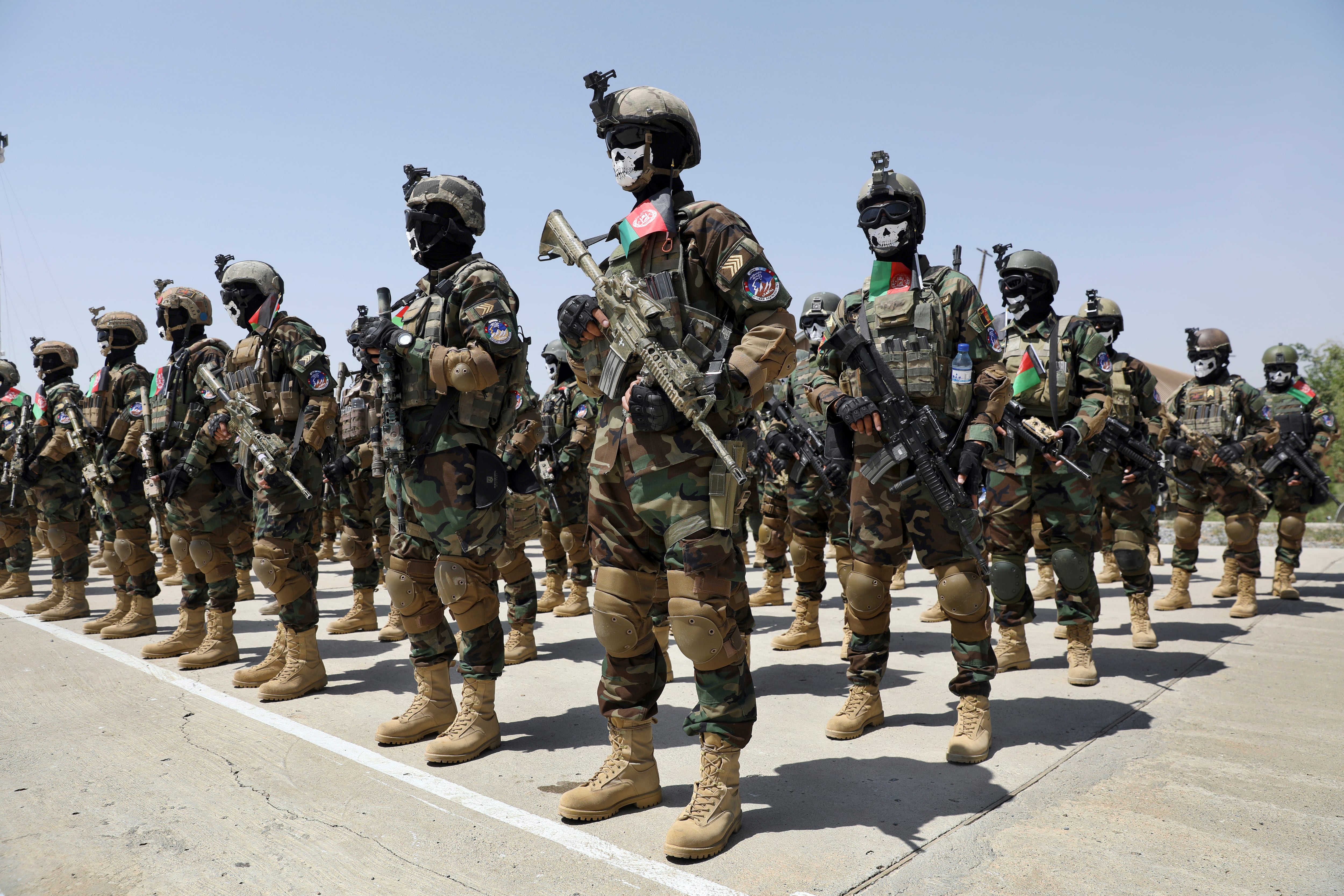 New Afghan Army special forces members attend their graduation ceremony after a three-month training program at the Kabul Military Training Center in Kabul, Afghanistan, Saturday, July 17, 2021.