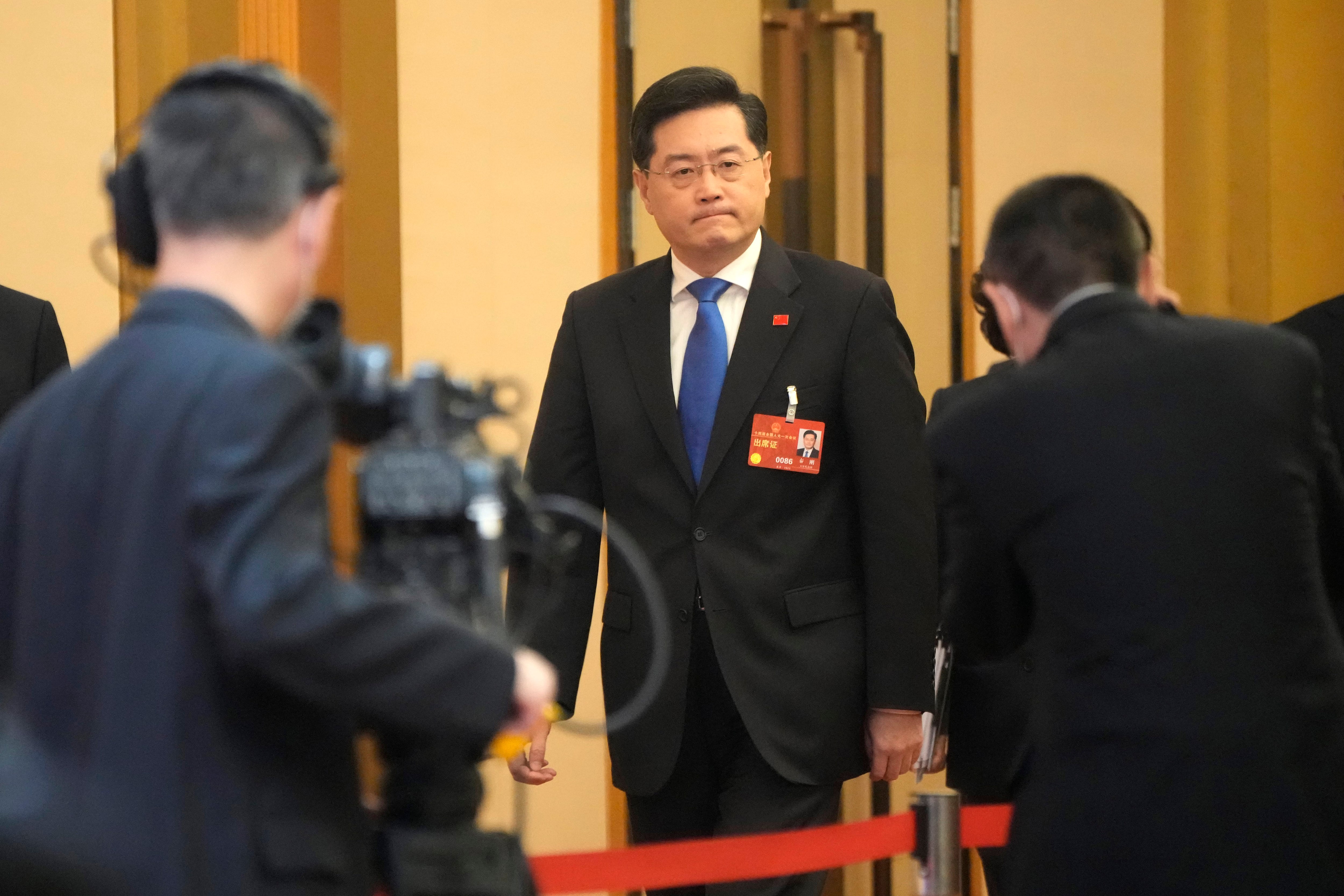 Chinese Foreign Minister Qin Gang arrives for a press conference held on the sidelines of the annual meeting of China's National People's Congress (NPC) in Beijing, Tuesday, March 7, 2023.