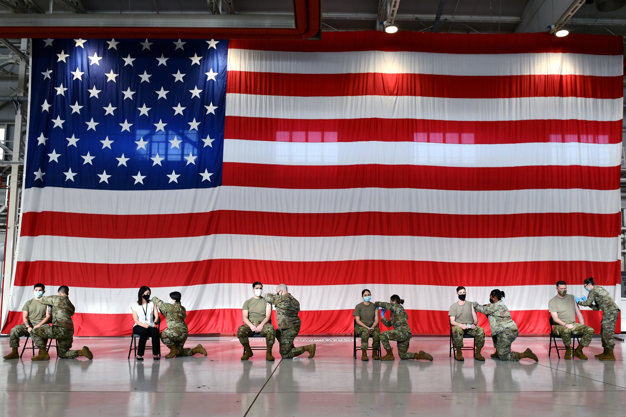 Six Airmen assigned to the 31st Medical Group receive the first Moderna COVID-19 vaccines at Aviano Air Base, Italy, Jan. 8, 2021.