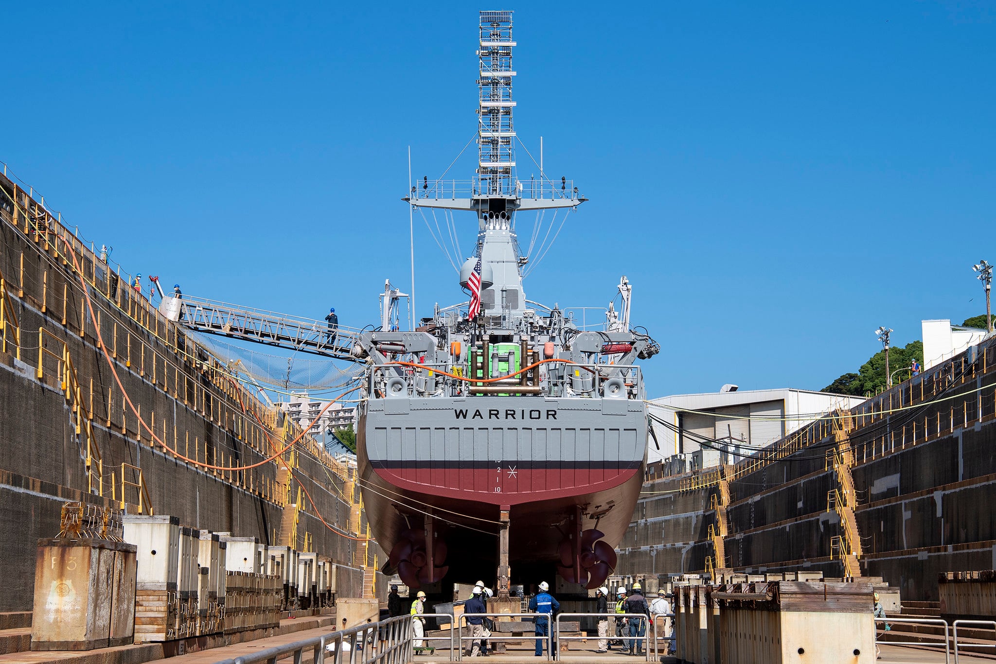 Ship repair facility personnel prepare to refloat the Avenger-class mine countermeasure ship USS Warrior (MCM 10) on June 10, 2020, in Sasebo, Japan.