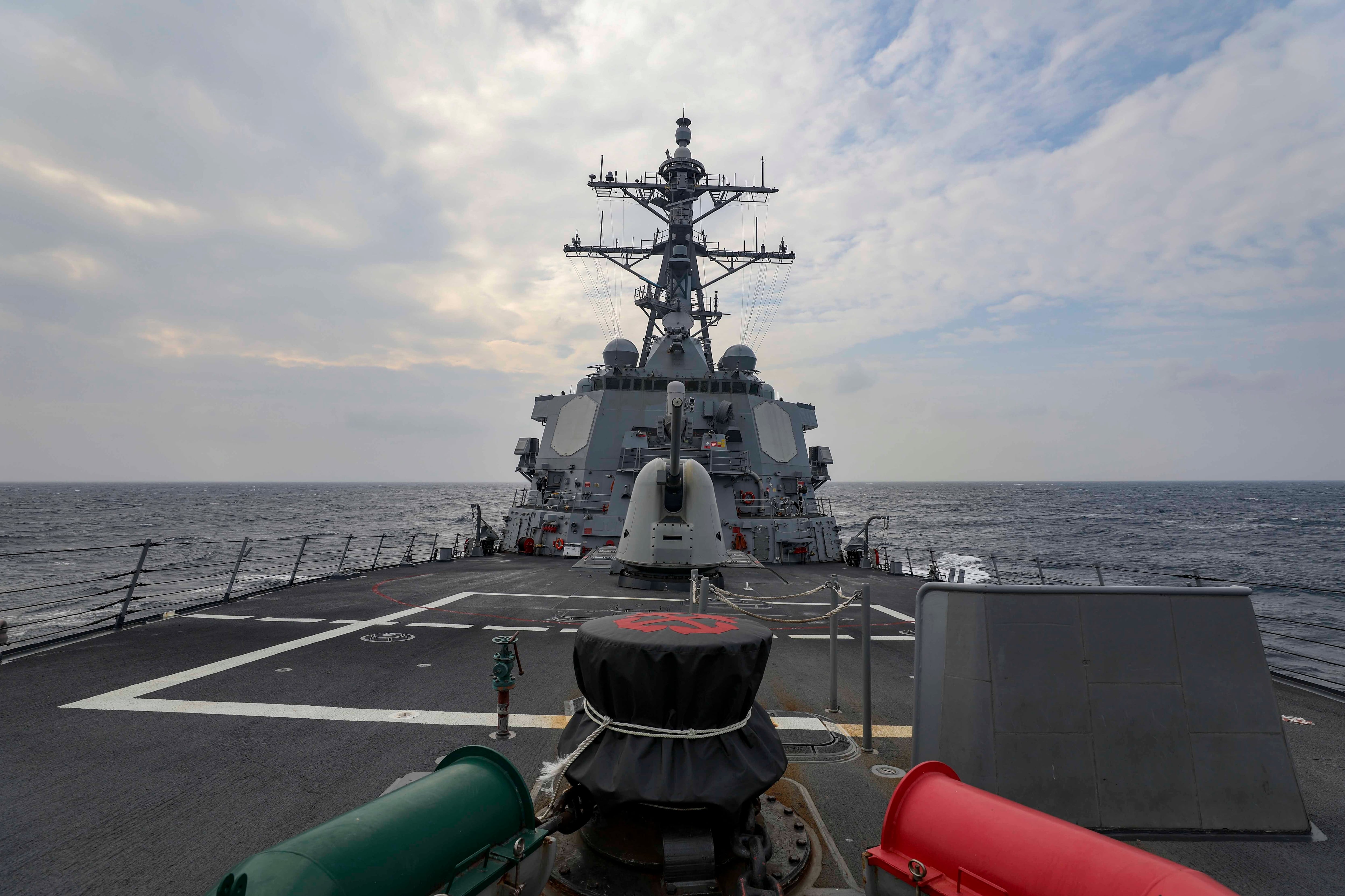 In this photo provided by U.S. Navy, The guided-missile destroyer Higgins conducts a routine Taiwan Strait transit Sept. 20, 2022.