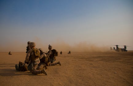 U.S. Marines with 1st Battalion, 7th Marine Regiment, attached to Special Purpose Marine Air-Ground Task Force Crisis Response-Central Command, post security during a tactical recovery of aircraft and personnel exercise at Camp Buehring, Kuwait, Aug. 7, 2019.