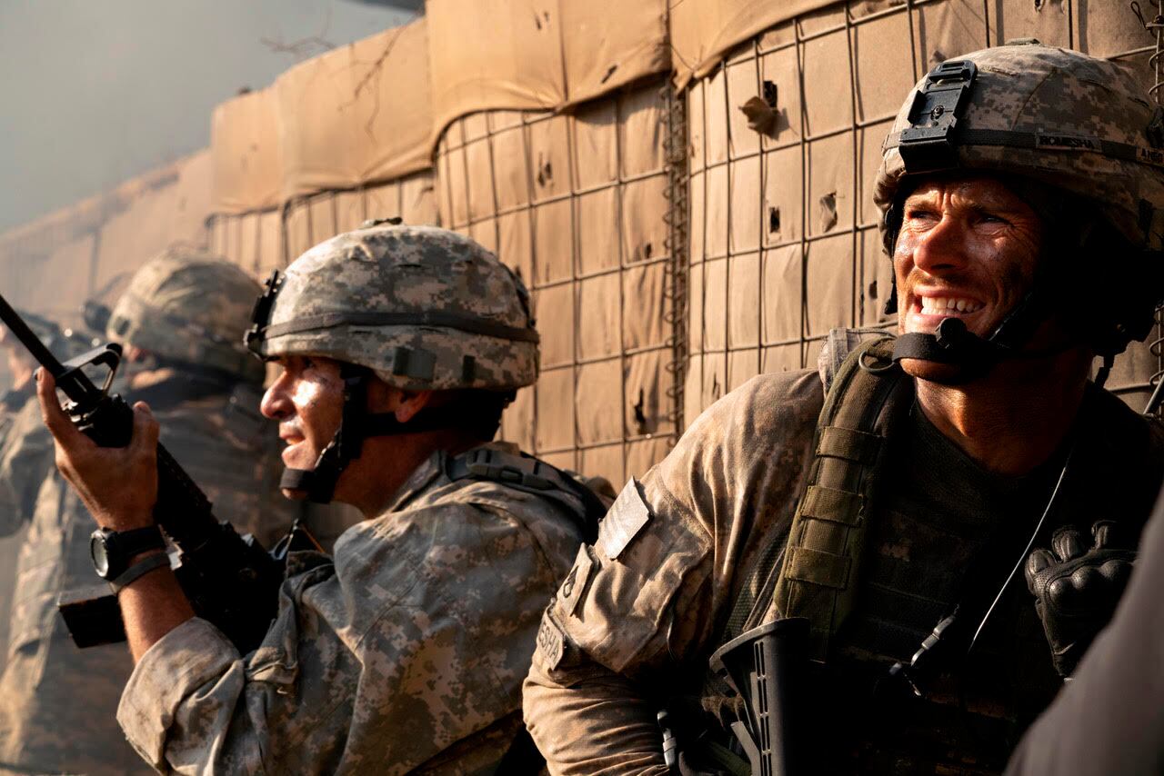 This image released by Screen Media shows Scott Eastwood, right, in a scene from "The Outpost."