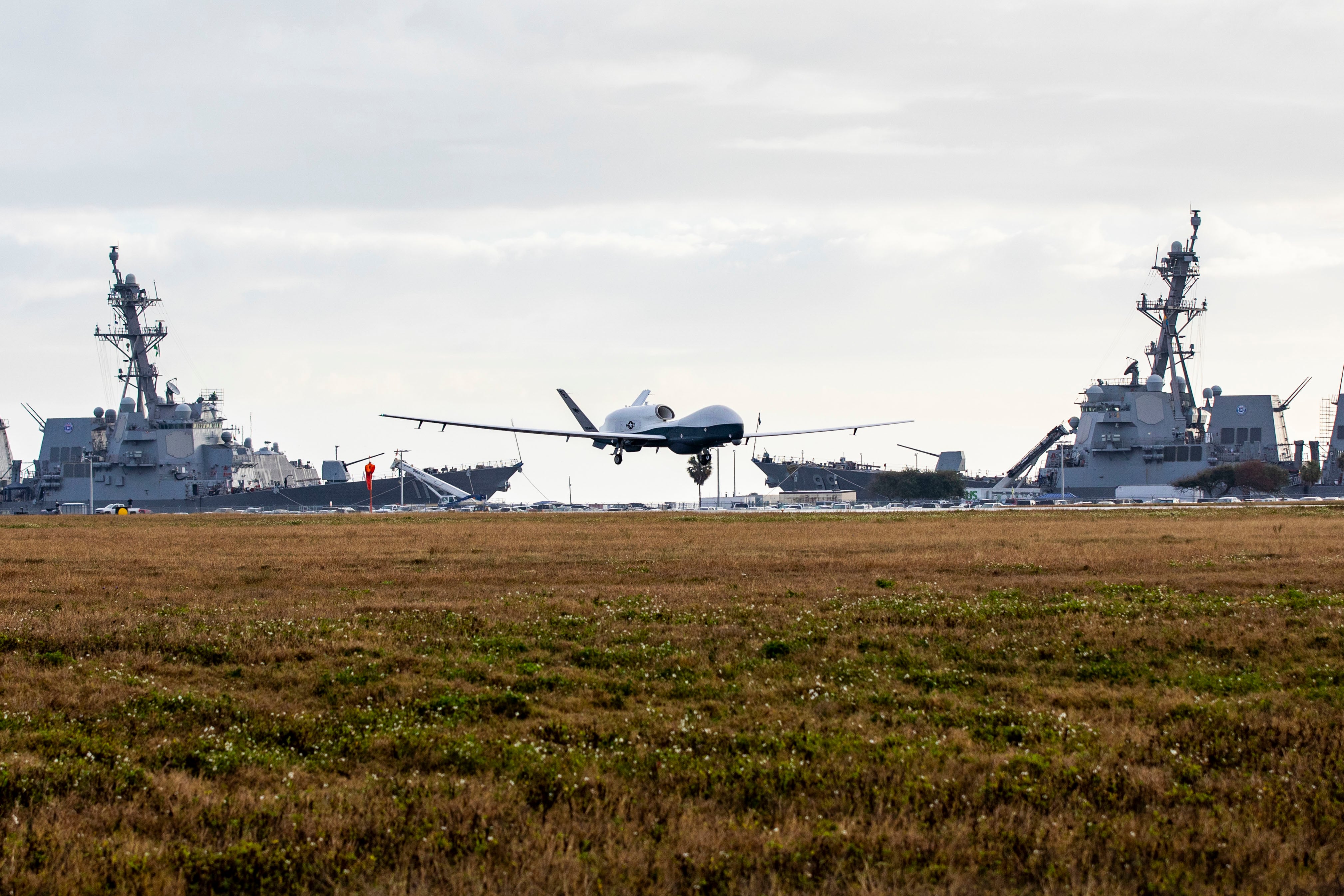 An MQ-4C Triton Unmanned Aircraft System, assigned to Unmanned Patrol Squadron 19, lands at Naval Station Mayport, Florida, in December 2021.