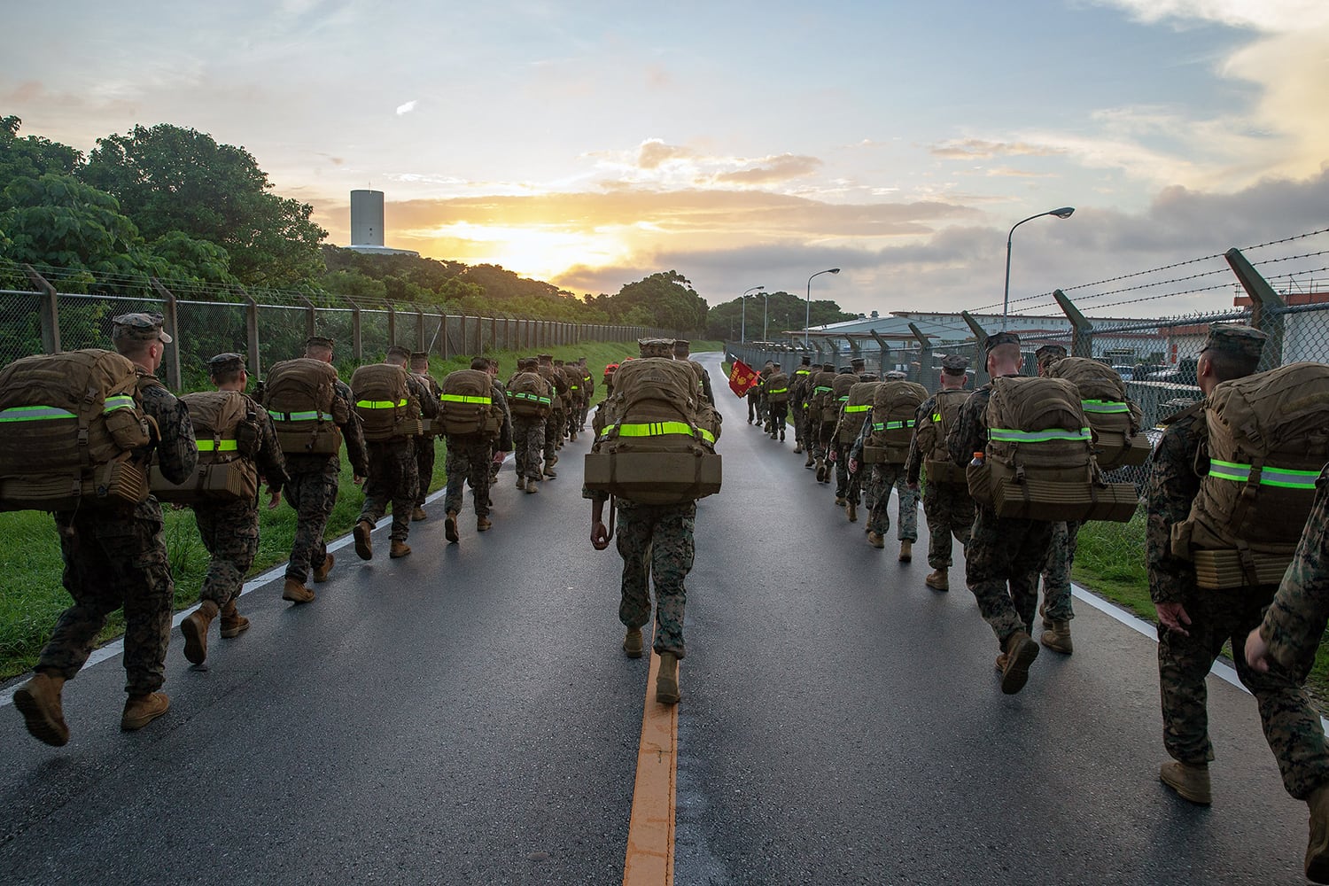 Marines participate in a 10 kilometer hike on Camp Hansen, Okinawa, Japan, July 12, 2019.